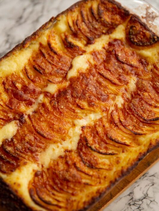 mashed potato gratin fresh out the oven in large baking dish