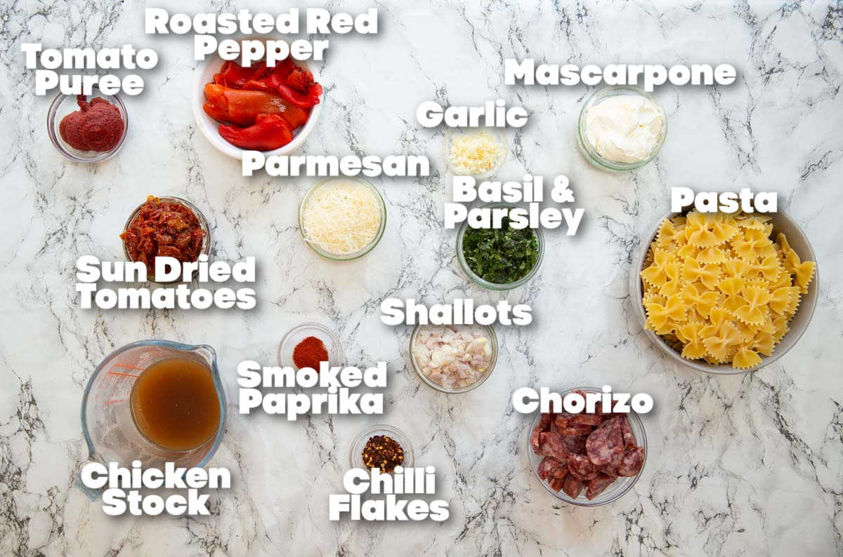 overhead shot of chorizo pasta ingredients with text labels