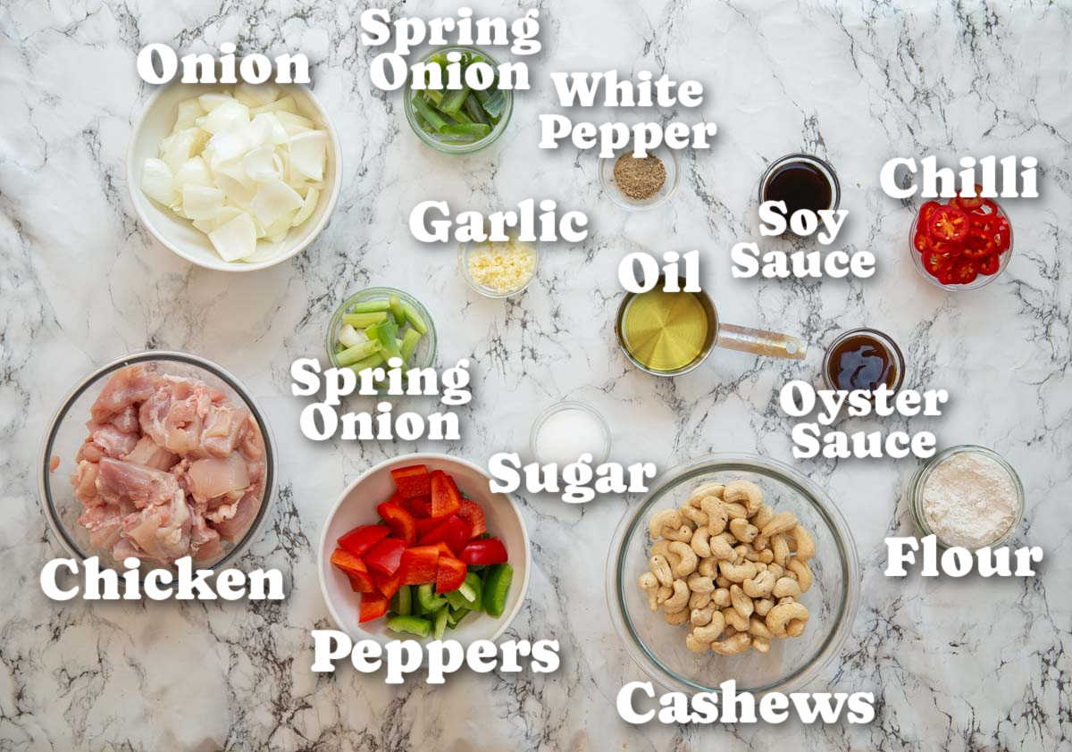 overhead shot of Thai cashew chicken ingredients with text labels