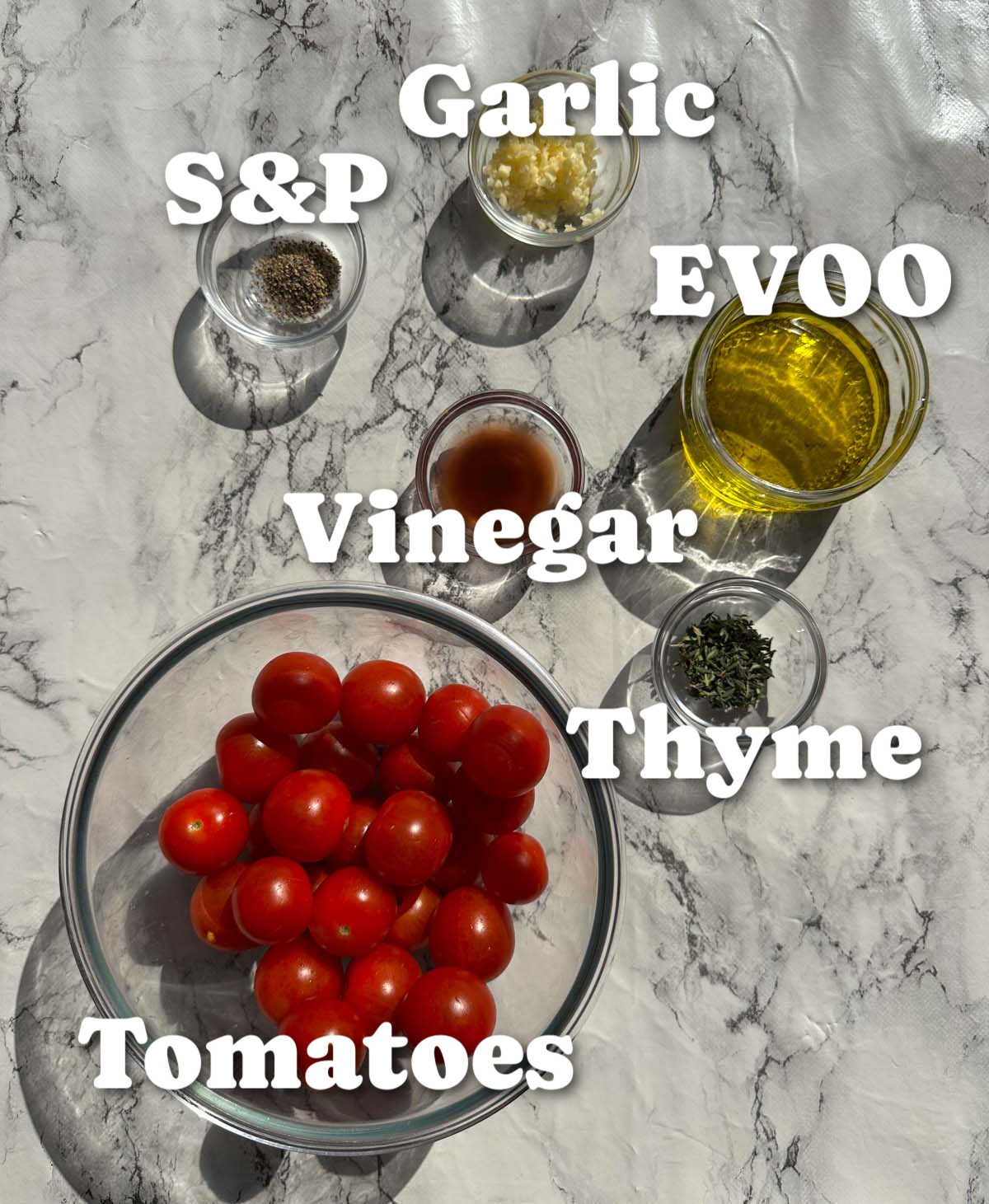 overhead shot of roasted tomatoes ingredients with text labels
