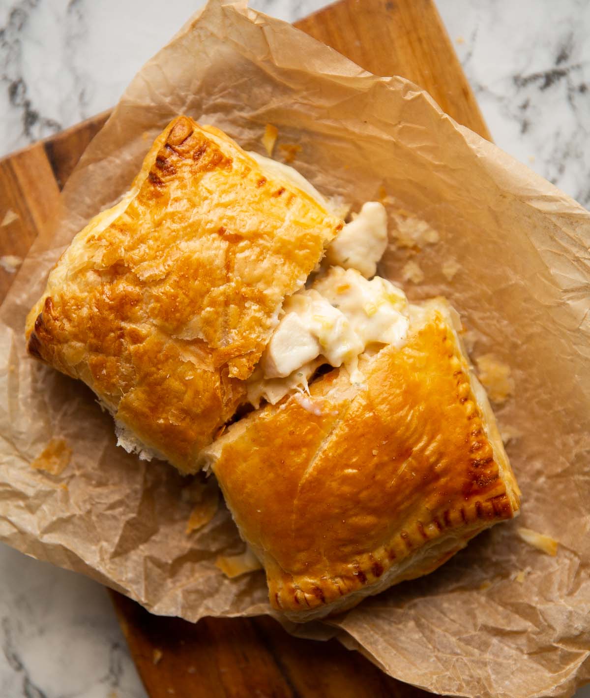 overhead shot of boursin puff pastry sliced open showing filling