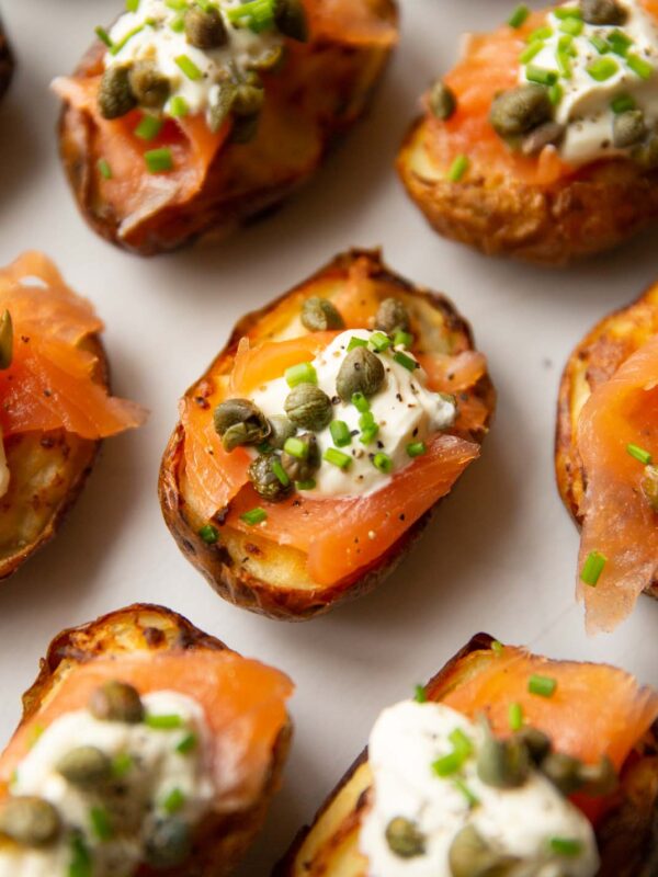 close up shot of smoked salmon potatoes on marble chopping board