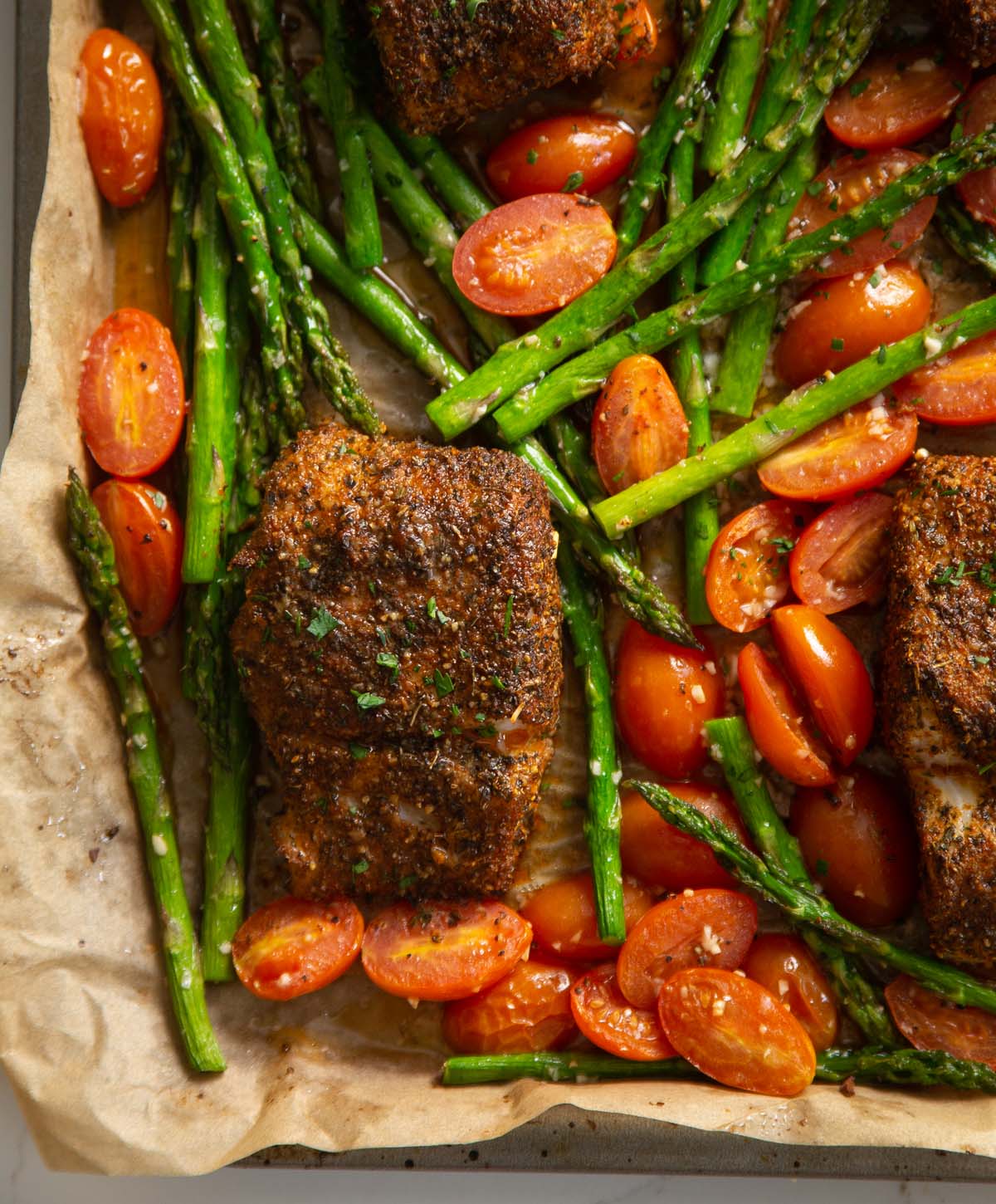overhead shot of cajun cod tray bake fresh out the oven