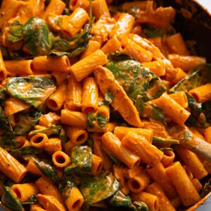 chicken rigatoni in large black frying pan