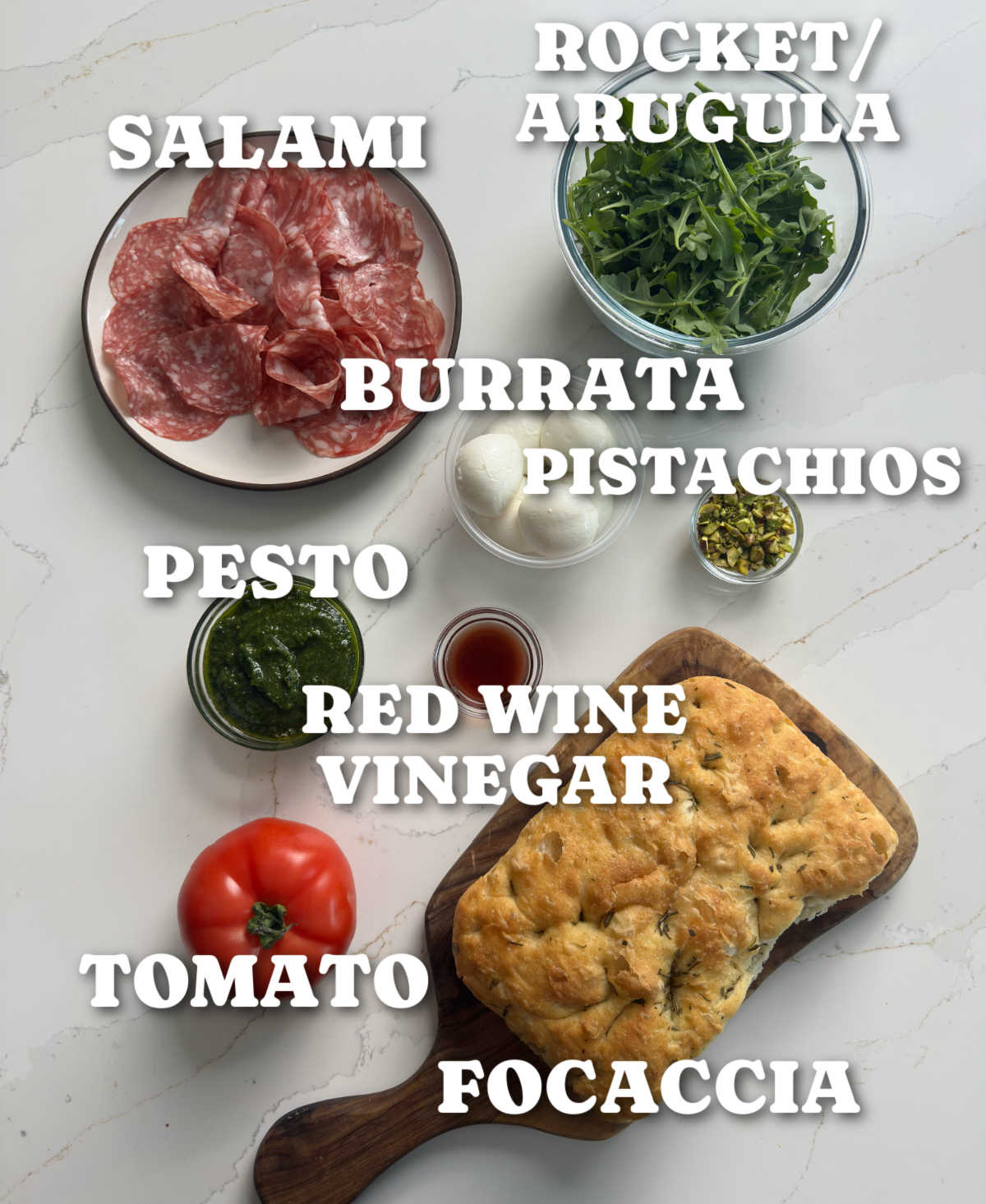 overhead shot of focaccia sandwich ingredients with text overlay