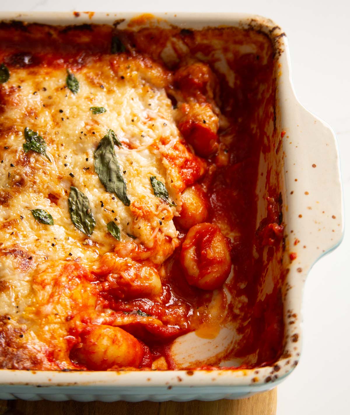 gnocchi alla sorrentina with portion missing fresh out the oven