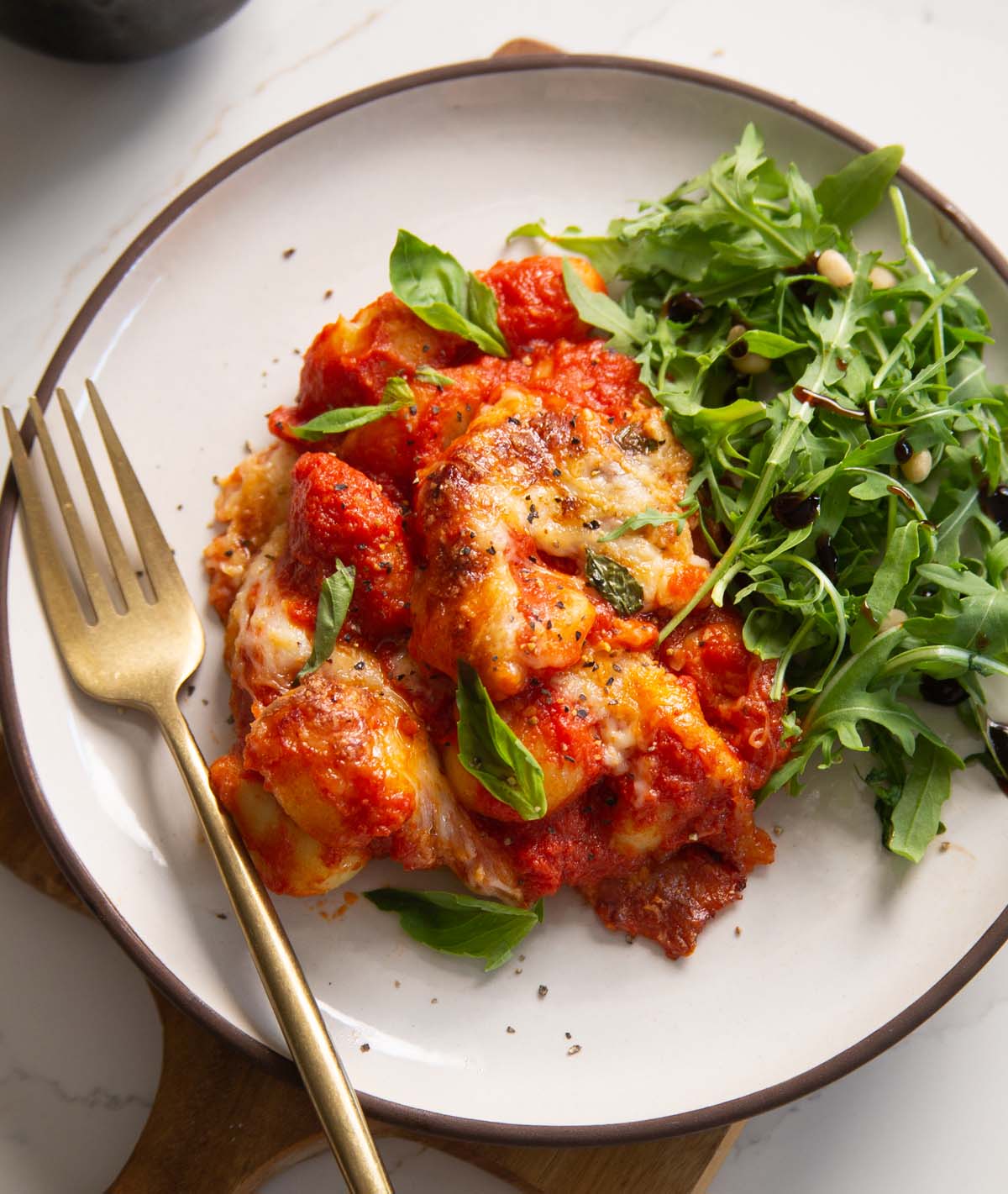 gnocchi alla sorrentina served in small white plate with sorrentina